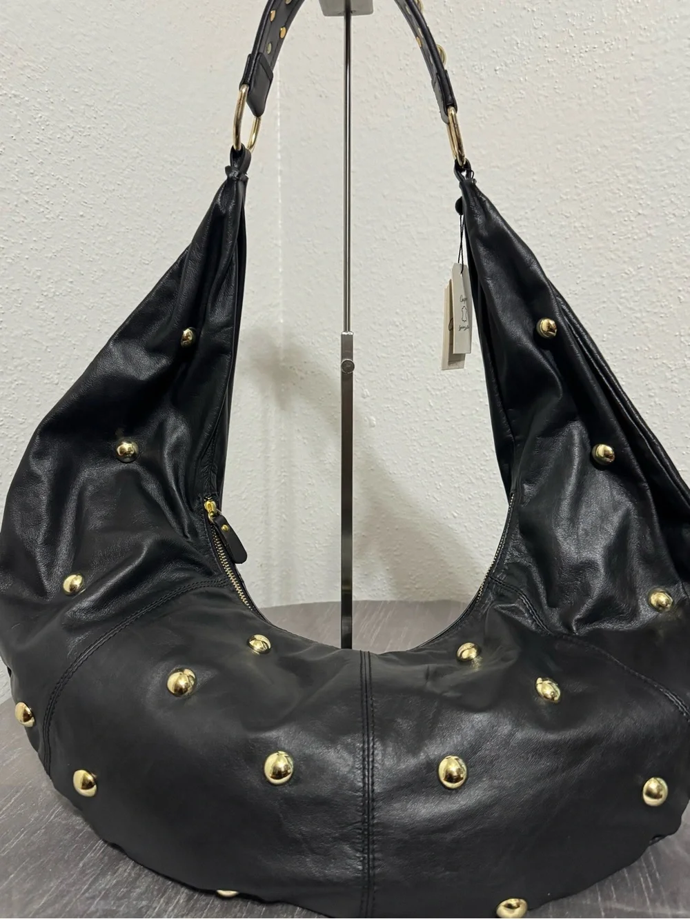 Chevignon Leather Black  Hobo with Gold Studded accents .